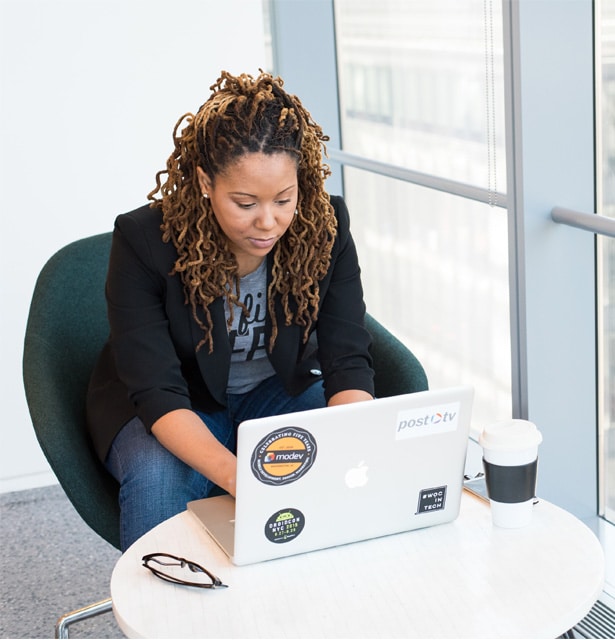 Professional virtual assistant working on laptop